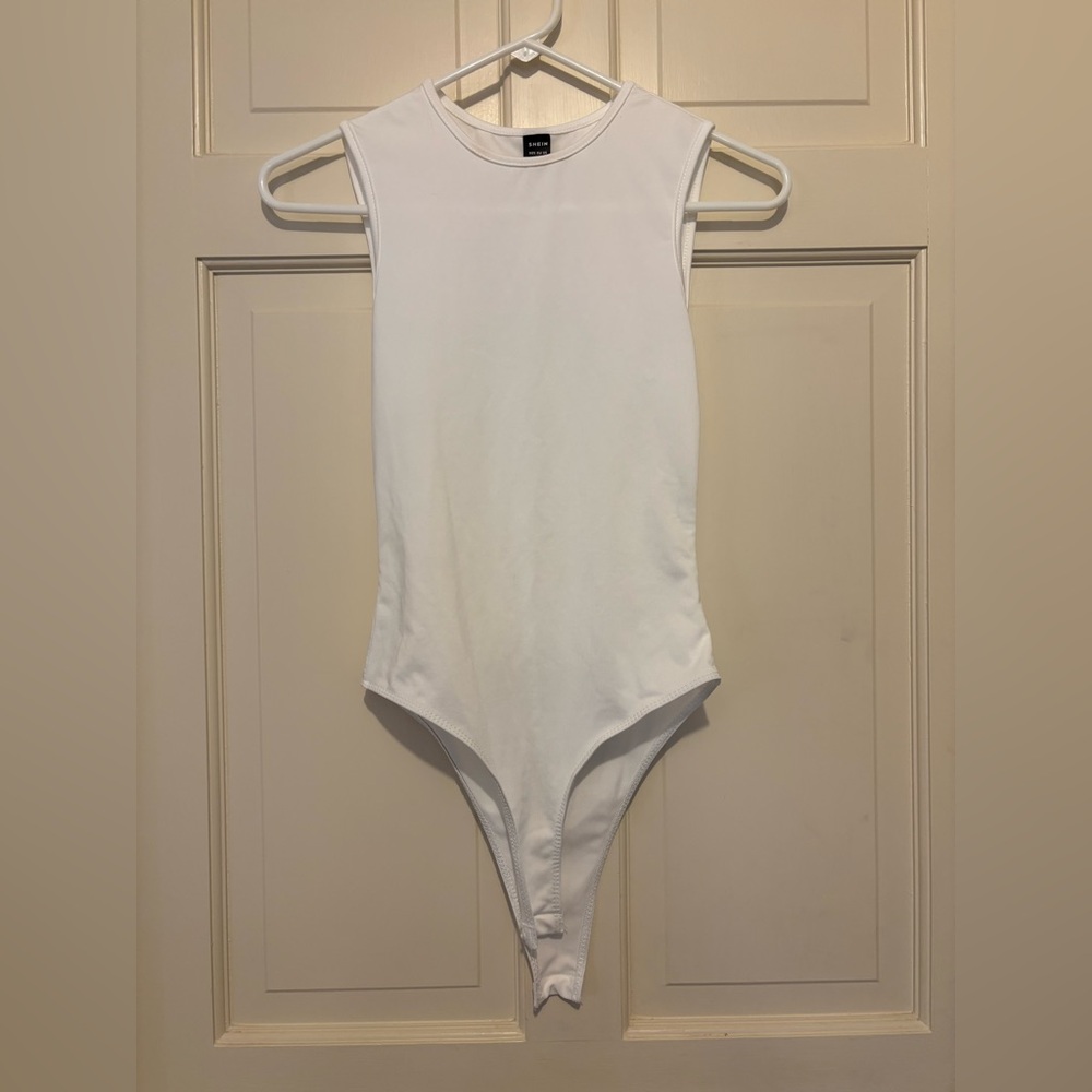 Women’s sleeveless white bodysuit athletic athleisure summer travel sexy holiday